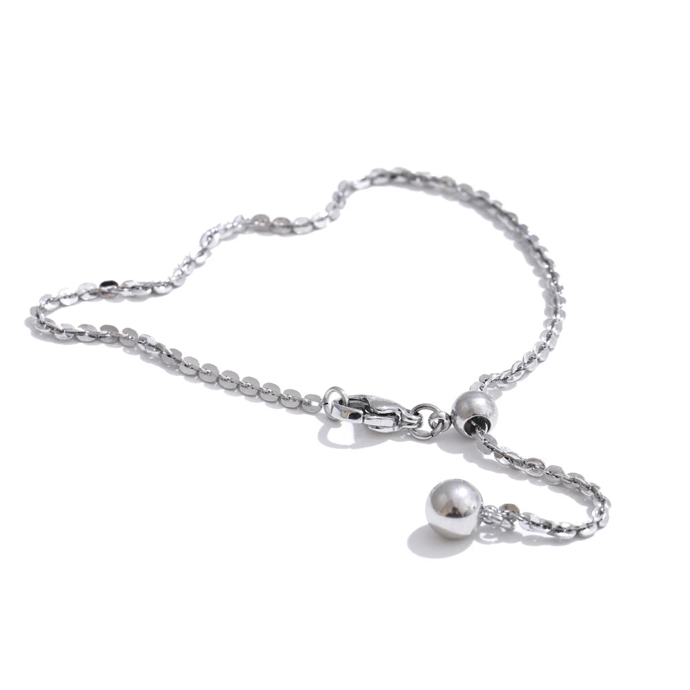 Fashion image styling charm bracelets with a modern chain bracelet