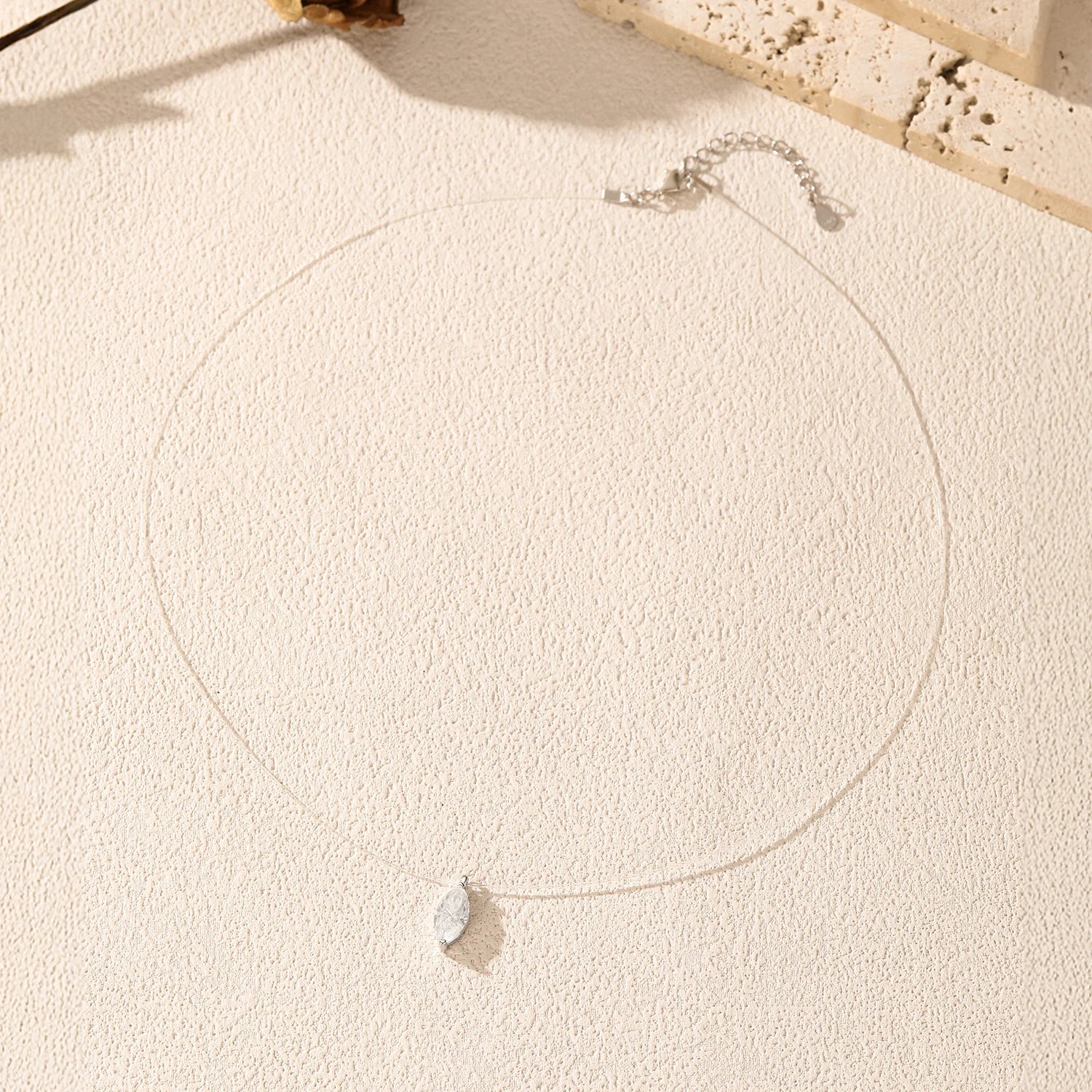 Delicate chain necklace in polished sterling silver with moissanite