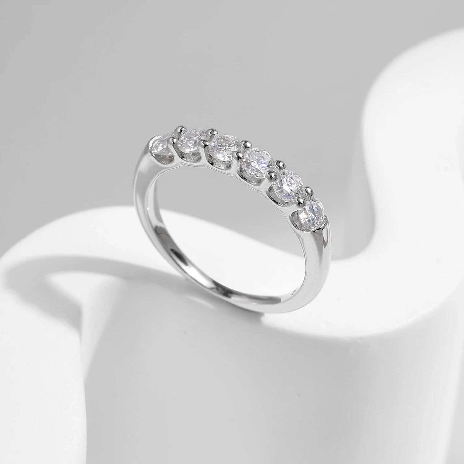 Eternity rings detail with moissanite diamonds in sterling silver setting