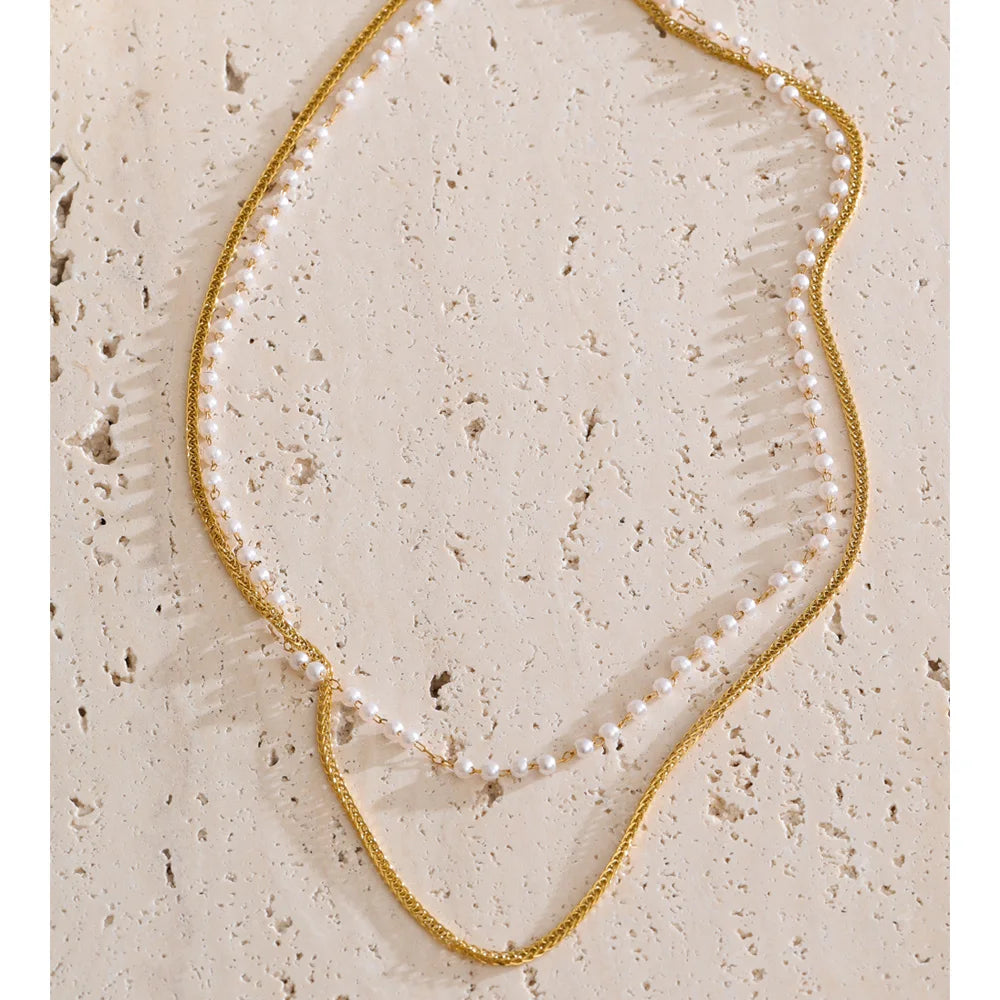 Necklace pearl necklace style featuring layered pearl accents