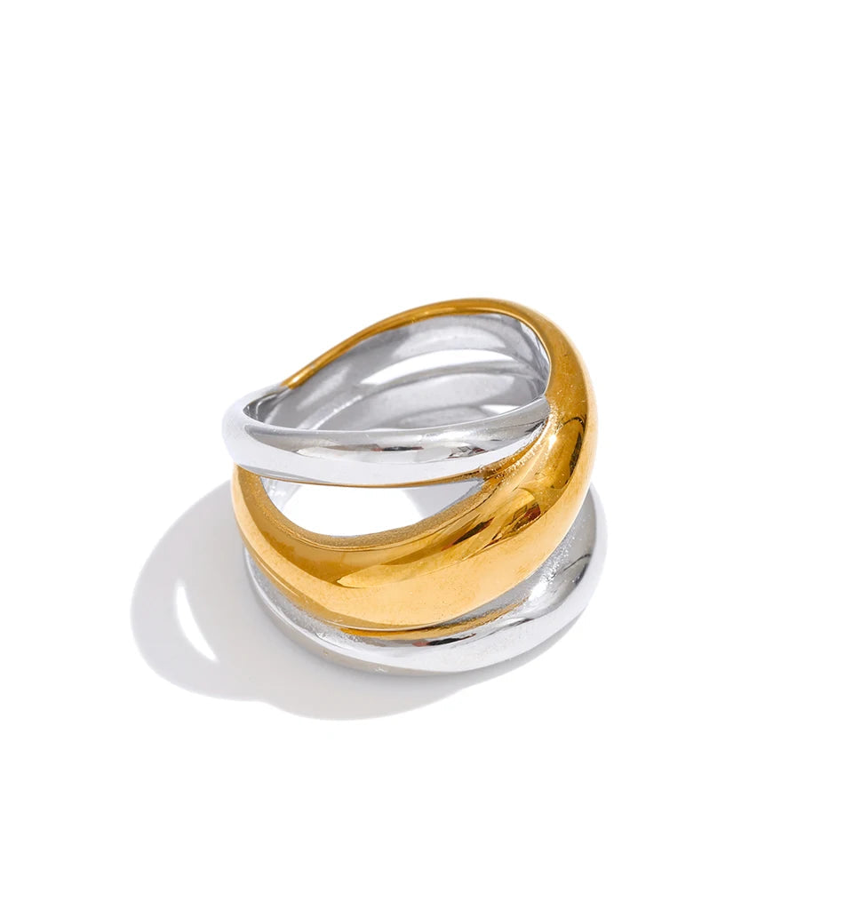 Sculpted gold ring showing strong ring dimension