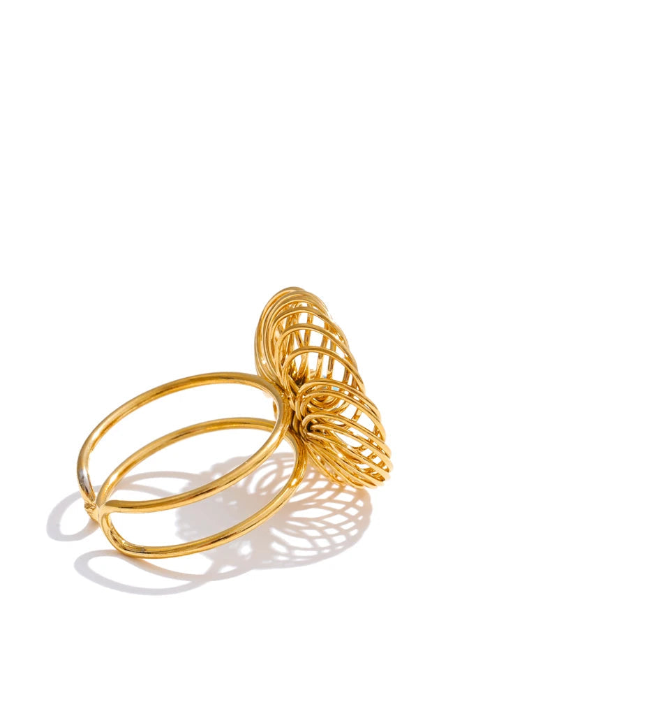 Natural stone flower ring worn on hand in lifestyle image capturing daily elegance