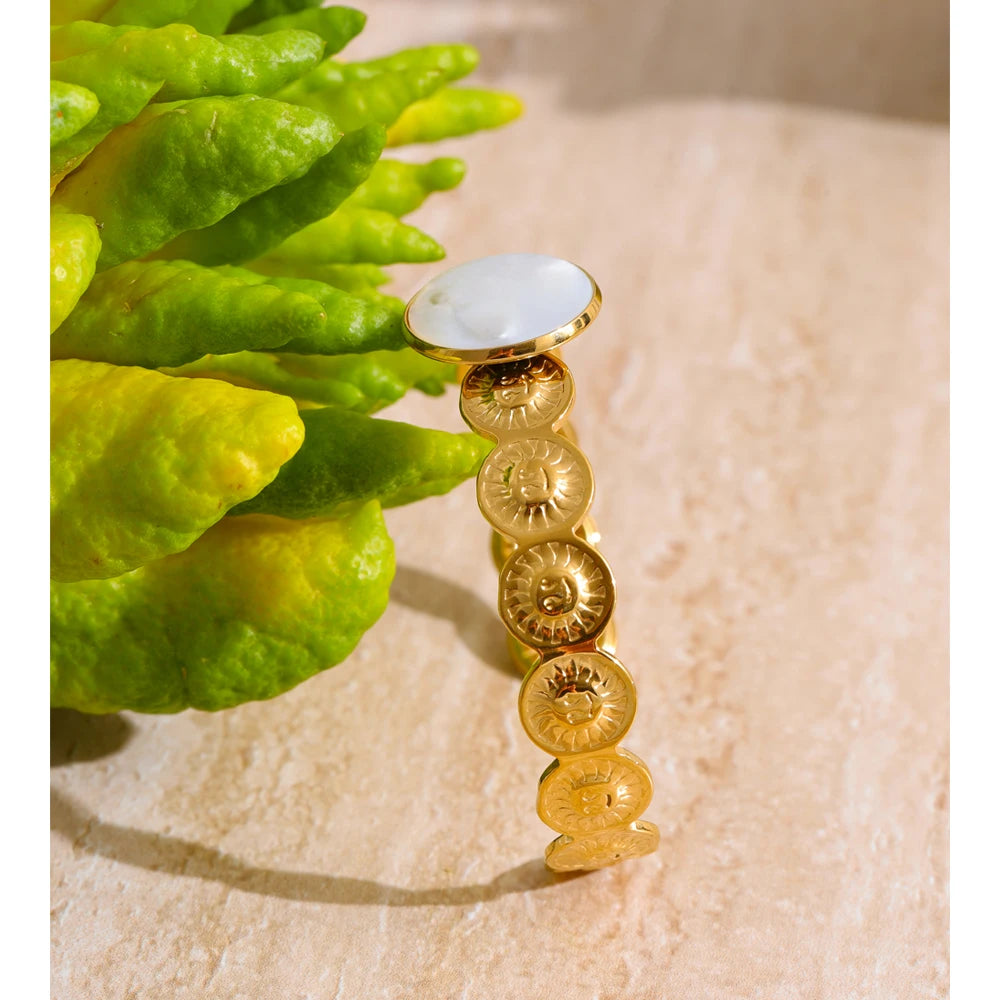 radiant gold bracelet with shell sun texture design for women