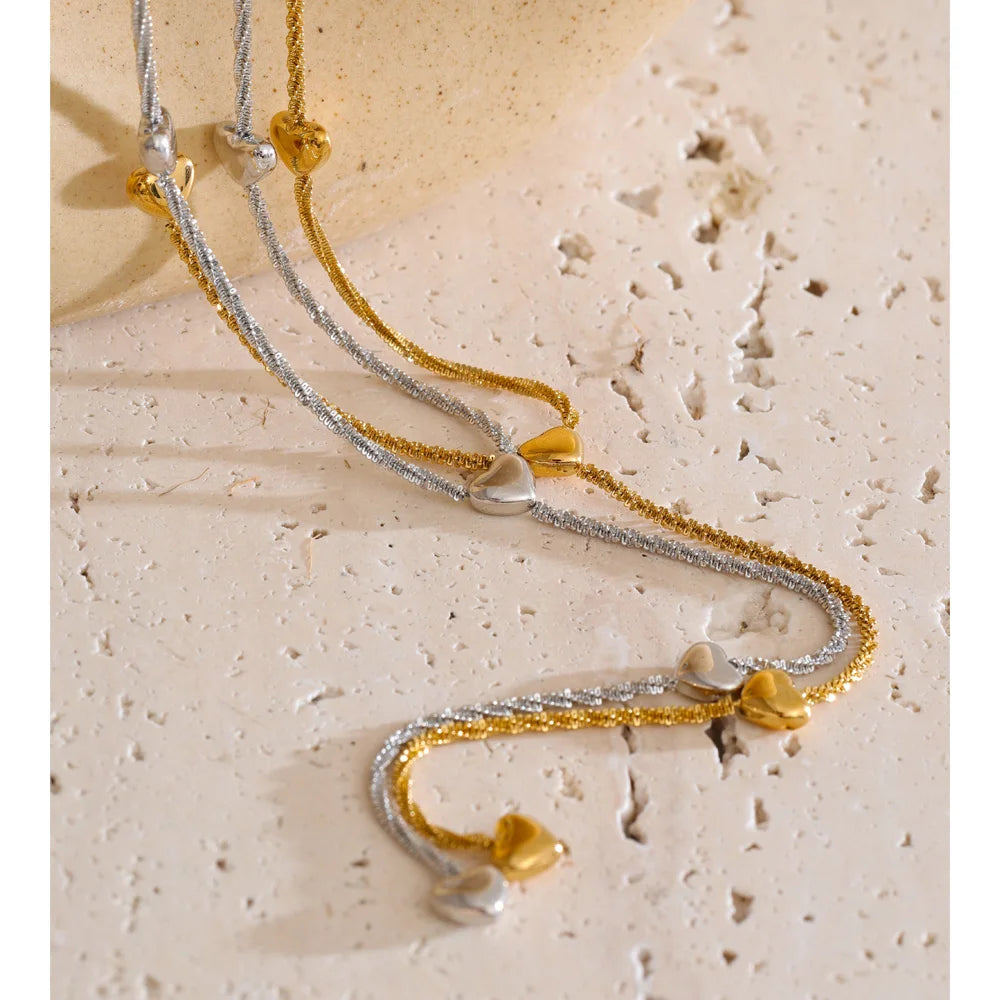 Women wearing attractive women necklace with heart pendant