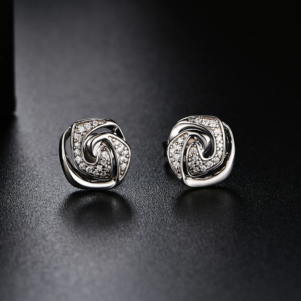 925 sterling silver studs featuring bright moissanite diamonds