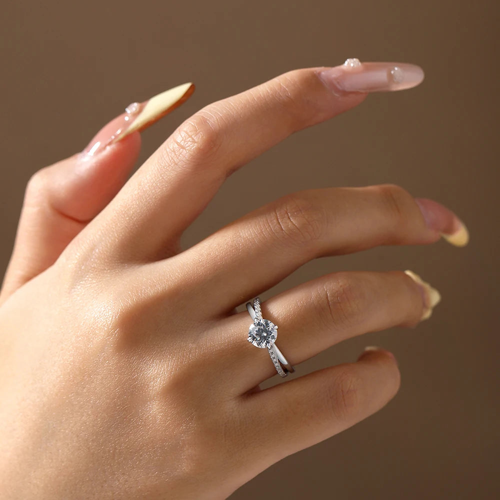 Wedding band style moissanite ring in sterling silver