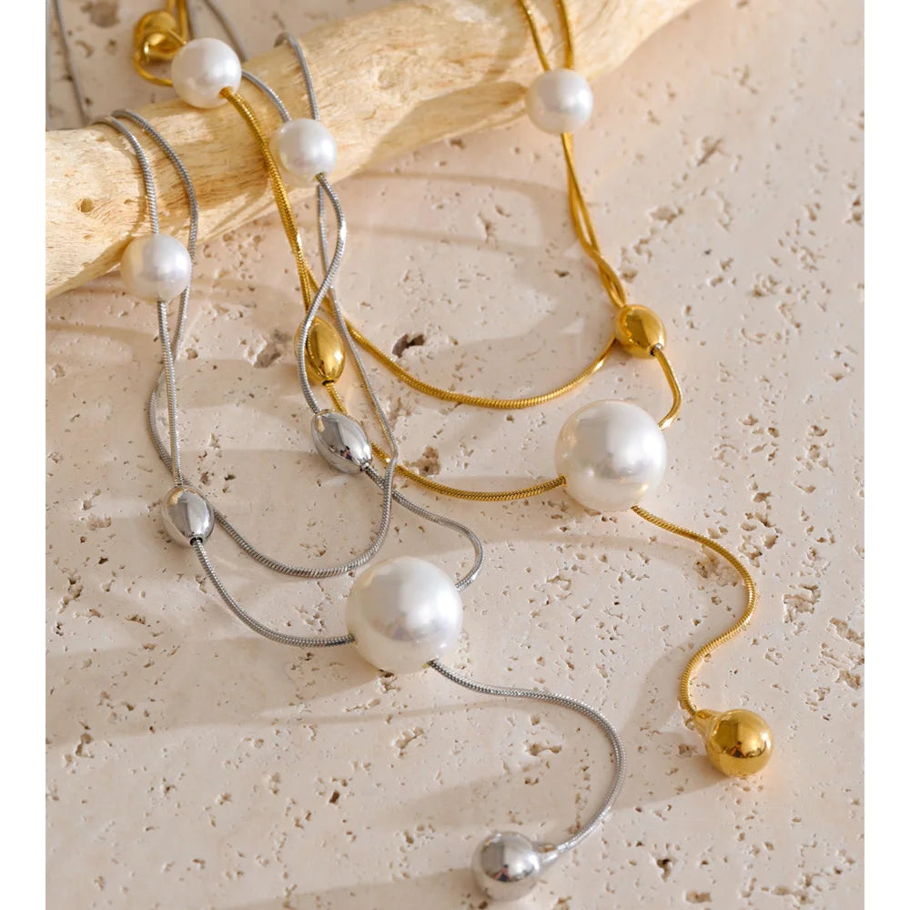 Necklace and necklace layering with bead and pearl accents