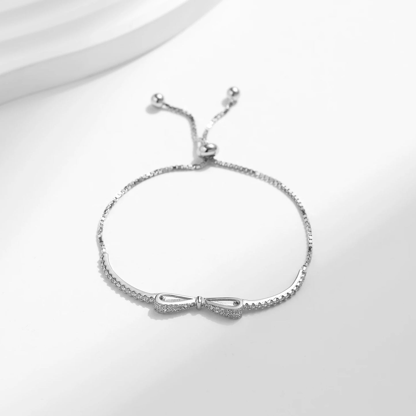 Sterling Silver Bowknot Bracelet with Sparkling Zirconia