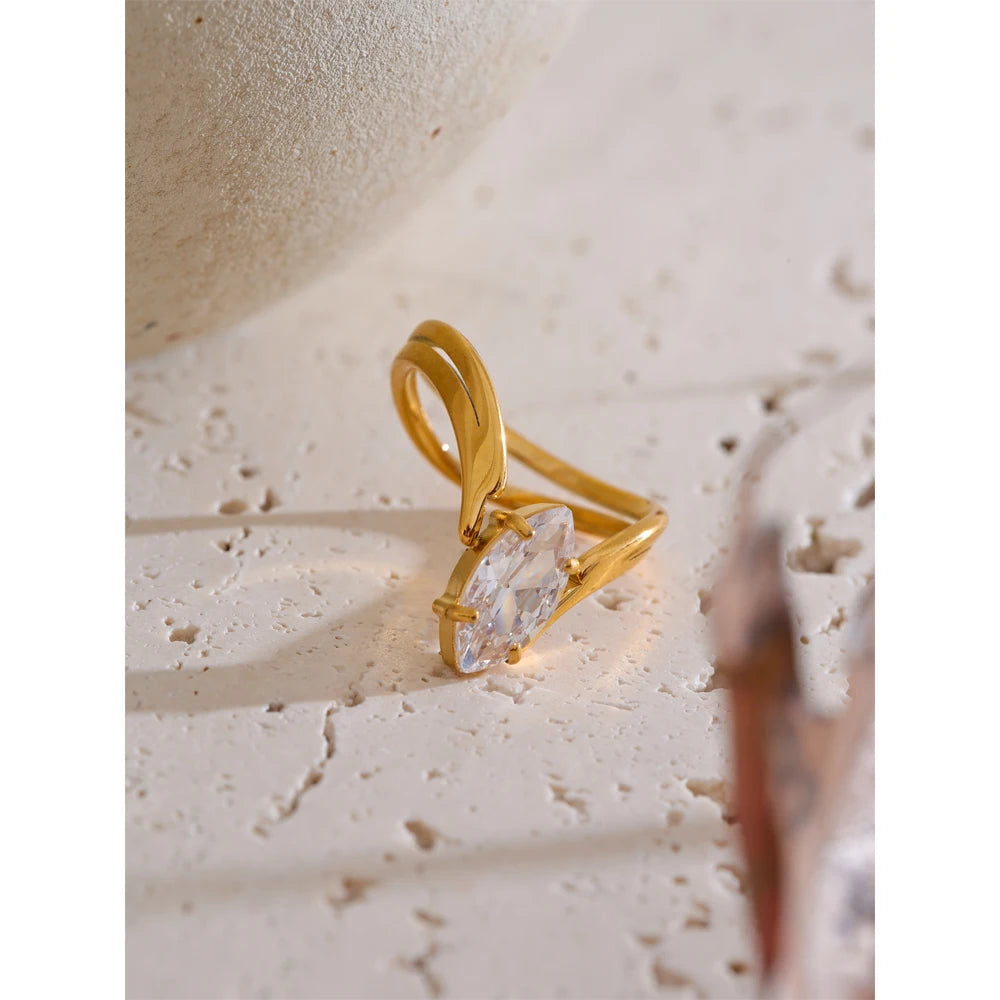 Fashion jewelry golden ring highlighting cubic zirconia stone