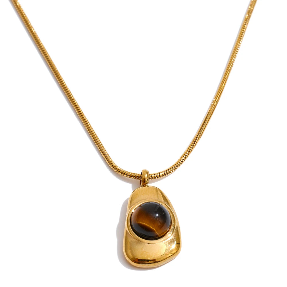 Layered edit featuring necklace and necklace arrangement with pearl earrings