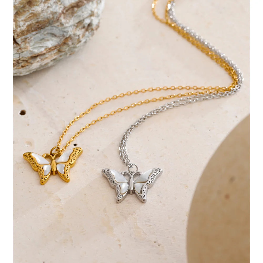 Elegant seashell necklace gold design featuring butterfly charm