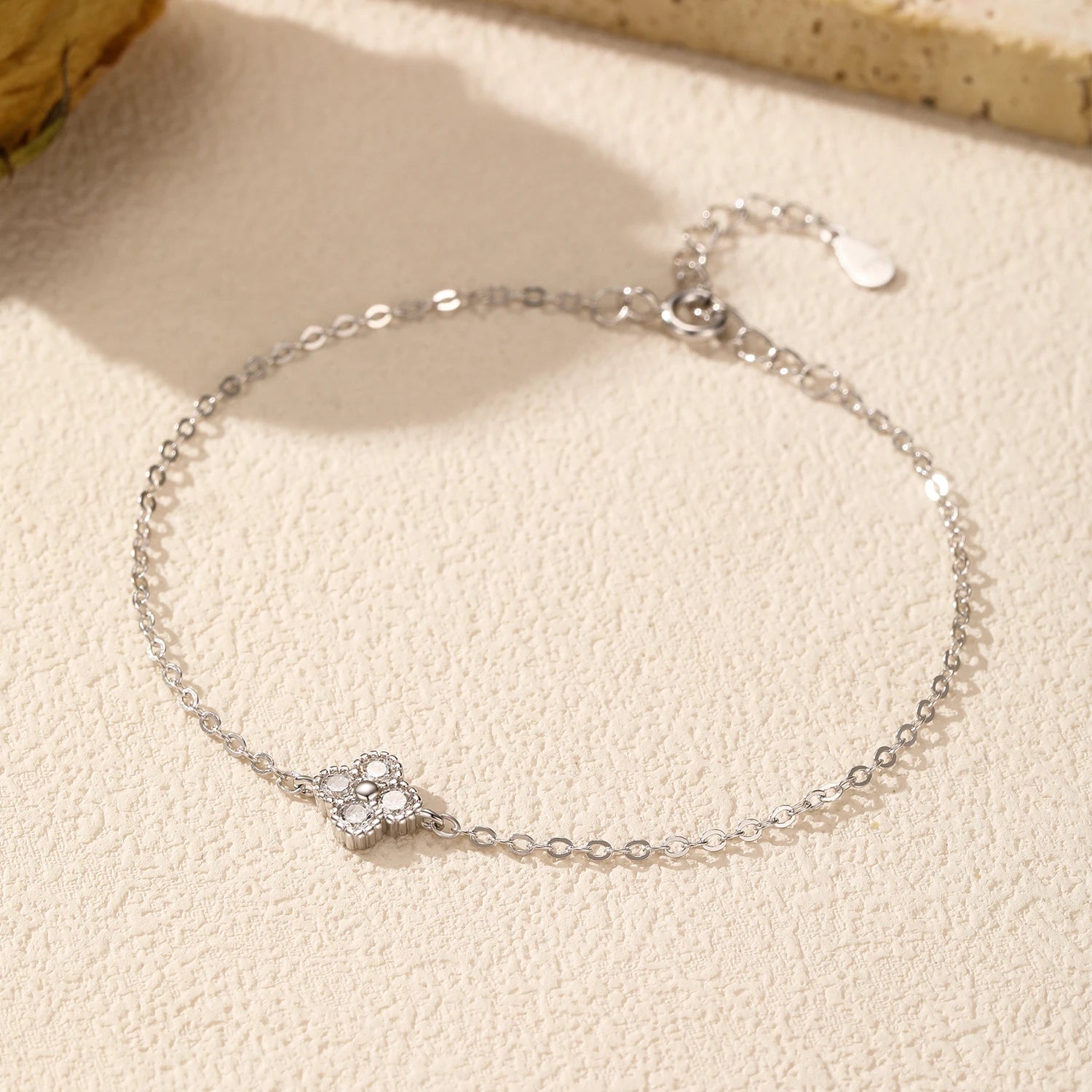 Stackable bracelet with clover CZ detail and subtle shine
