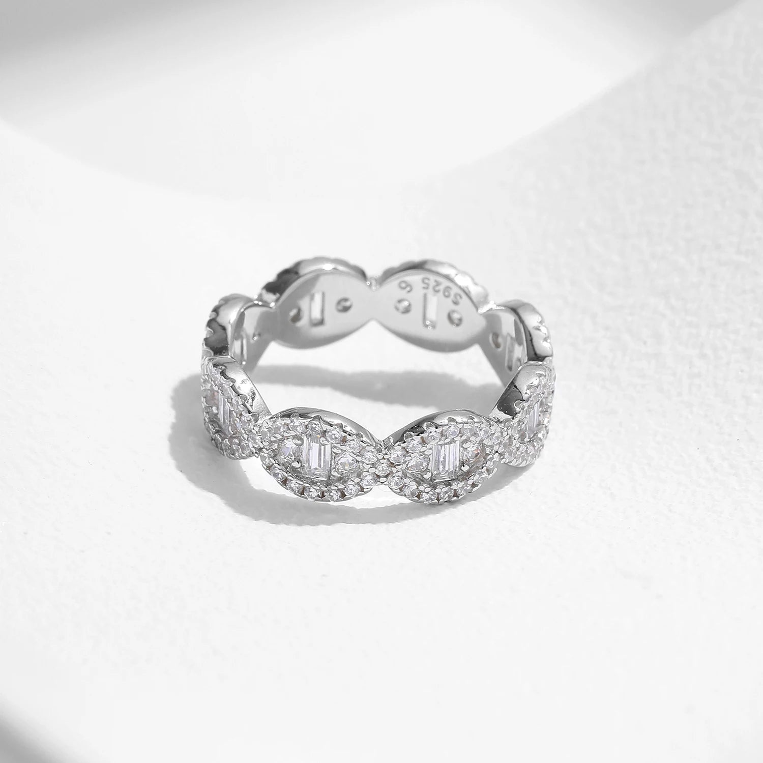 Ring size from ring guidance shown beside a clear CZ eternity band ring