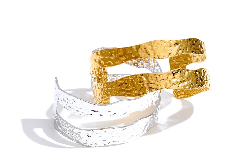 statement gold bangle bracelet with hammered texture for contemporary wear