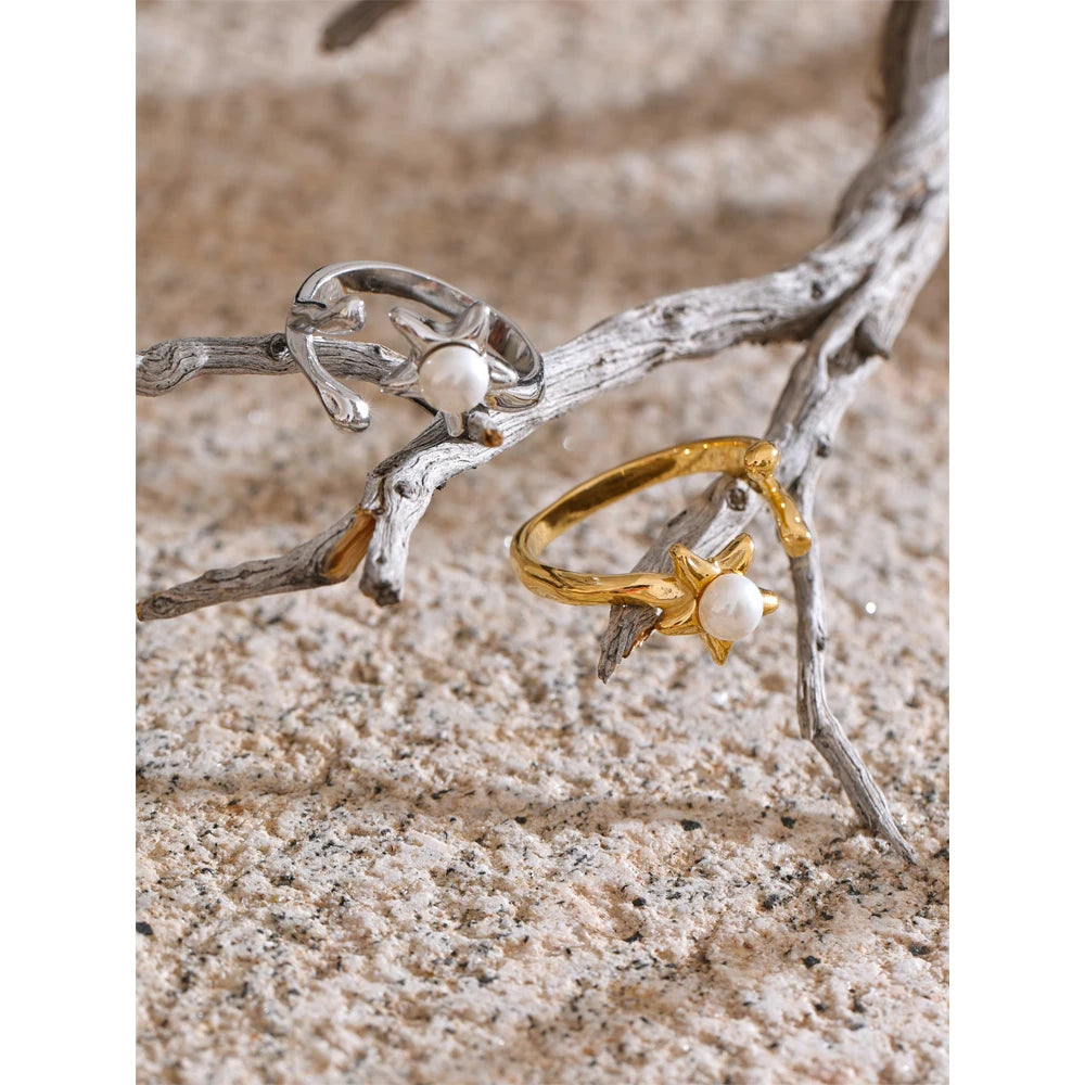 gold plated flower motif ring with simulated pearl and adjustable band stainless steel