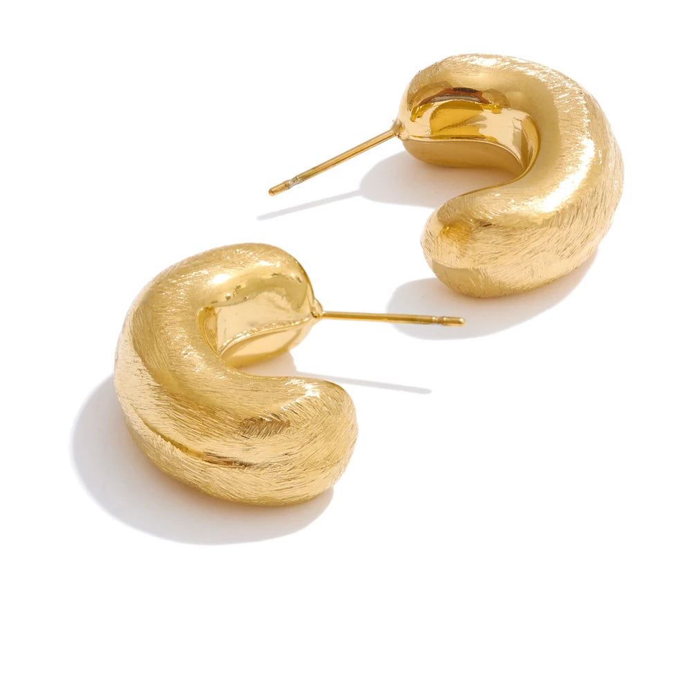 Gold plated hoop earrings in stainless steel jewelry with a smooth finish
