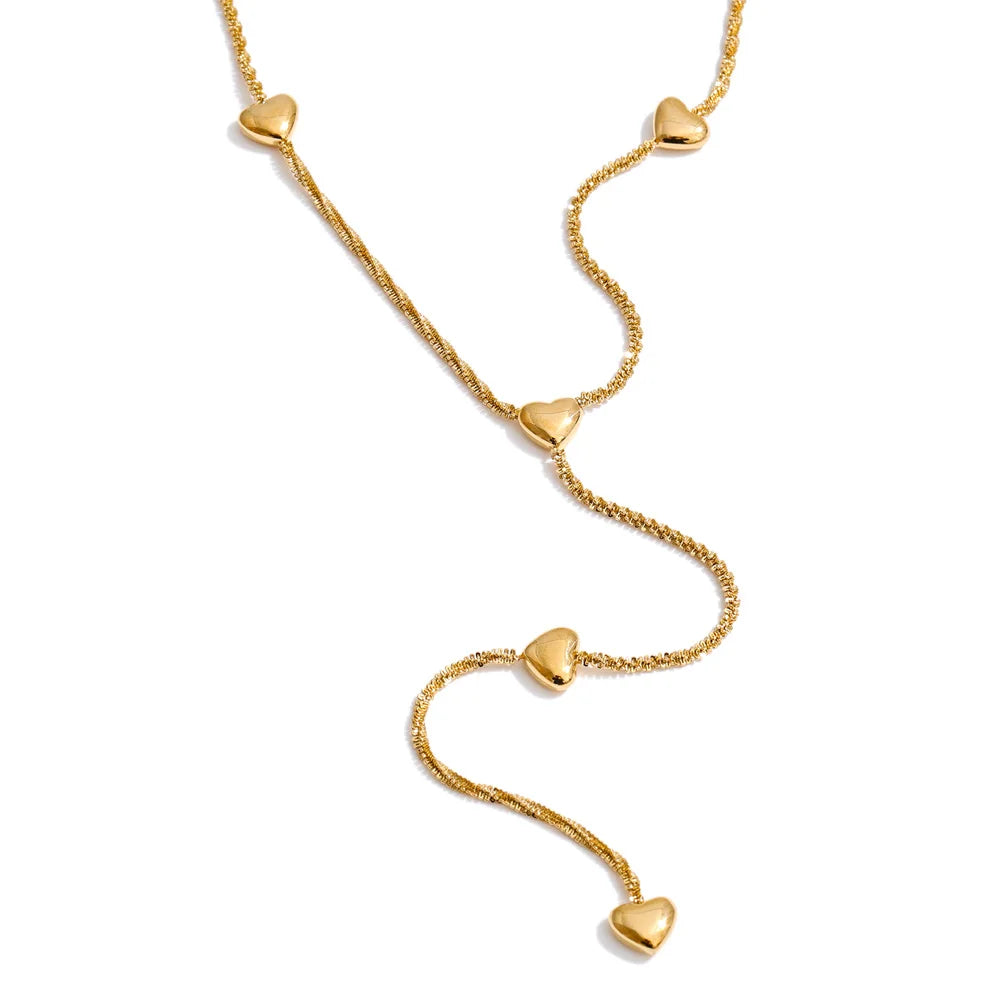 Closeup of gold plated heart love necklace accessory