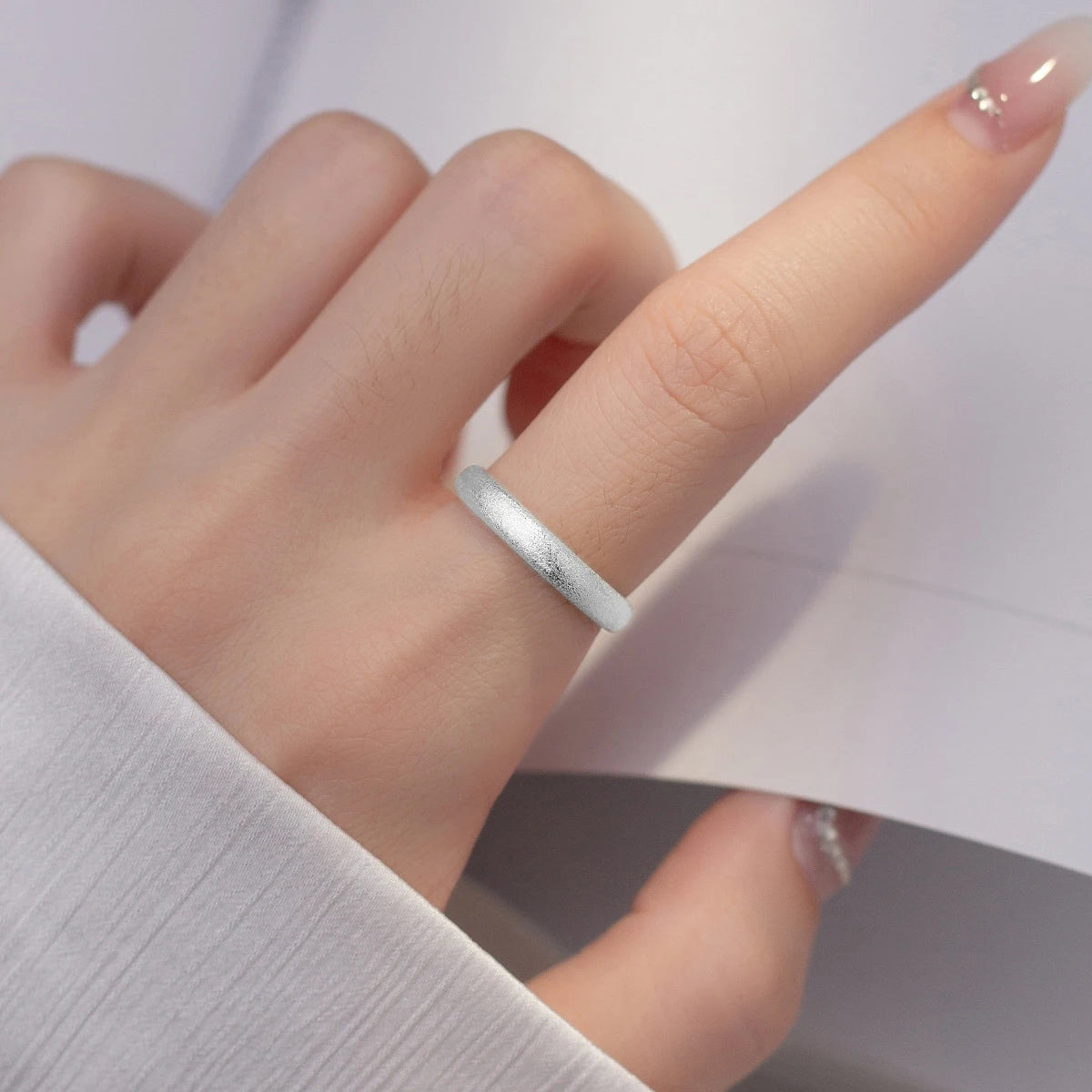 Refined silver ring showing a subtle gold a ring highlight