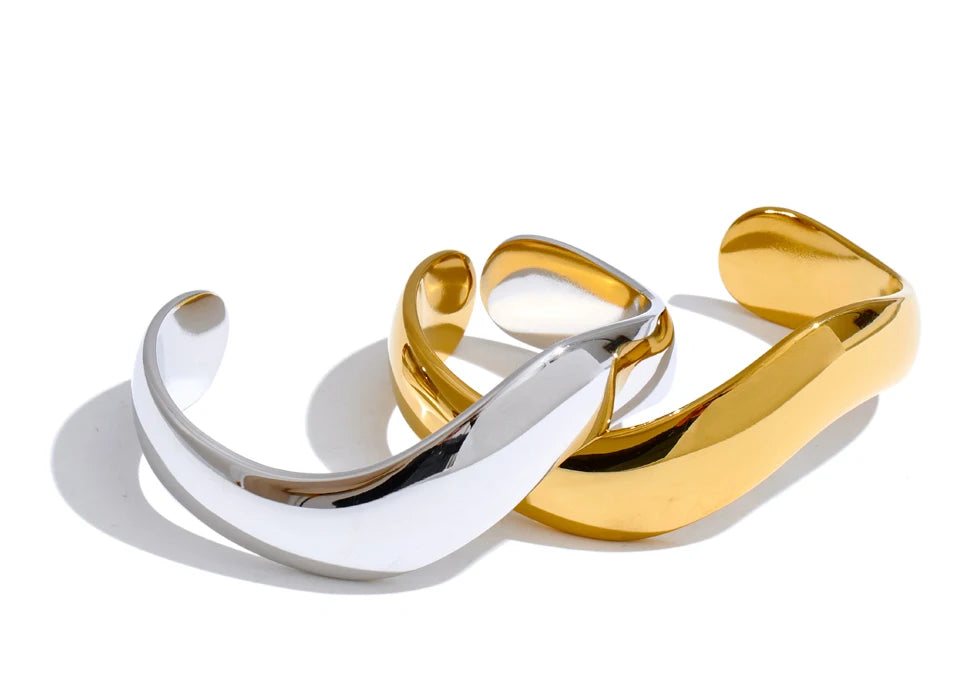 Modern gold bangle crafted in minimalist open shape