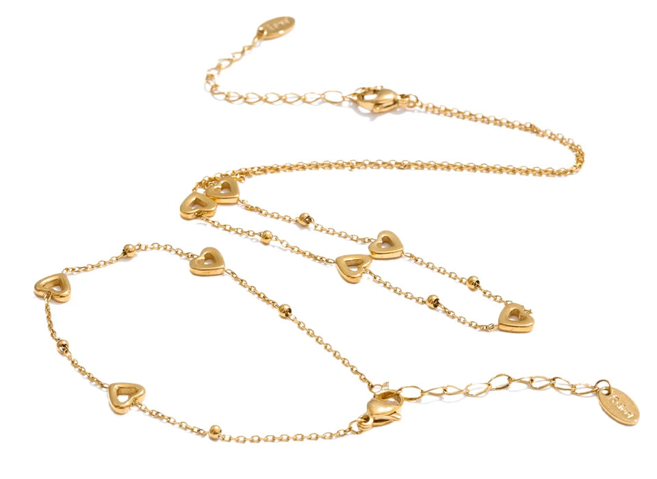 Golden charm necklace and bracelet set in stainless steel