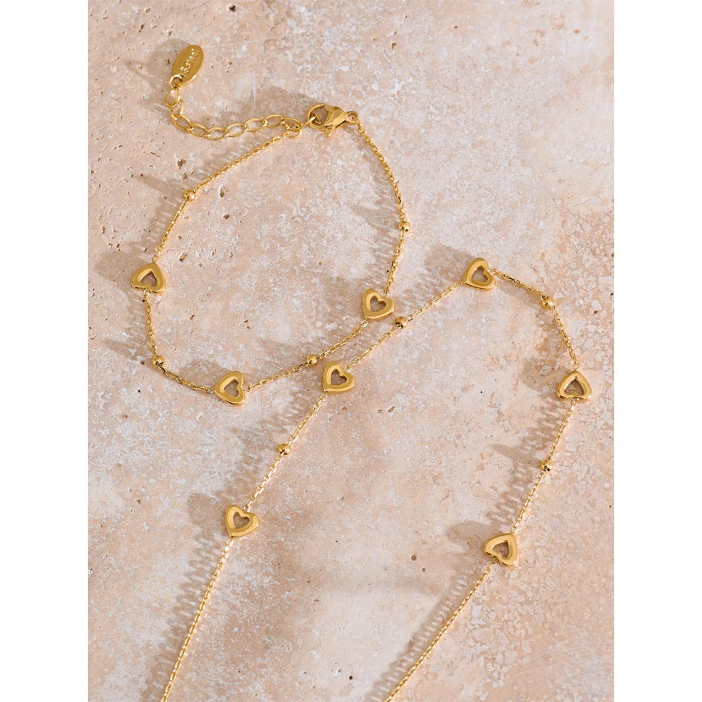 Gold bracelet crafted with charm bracelets charm detail