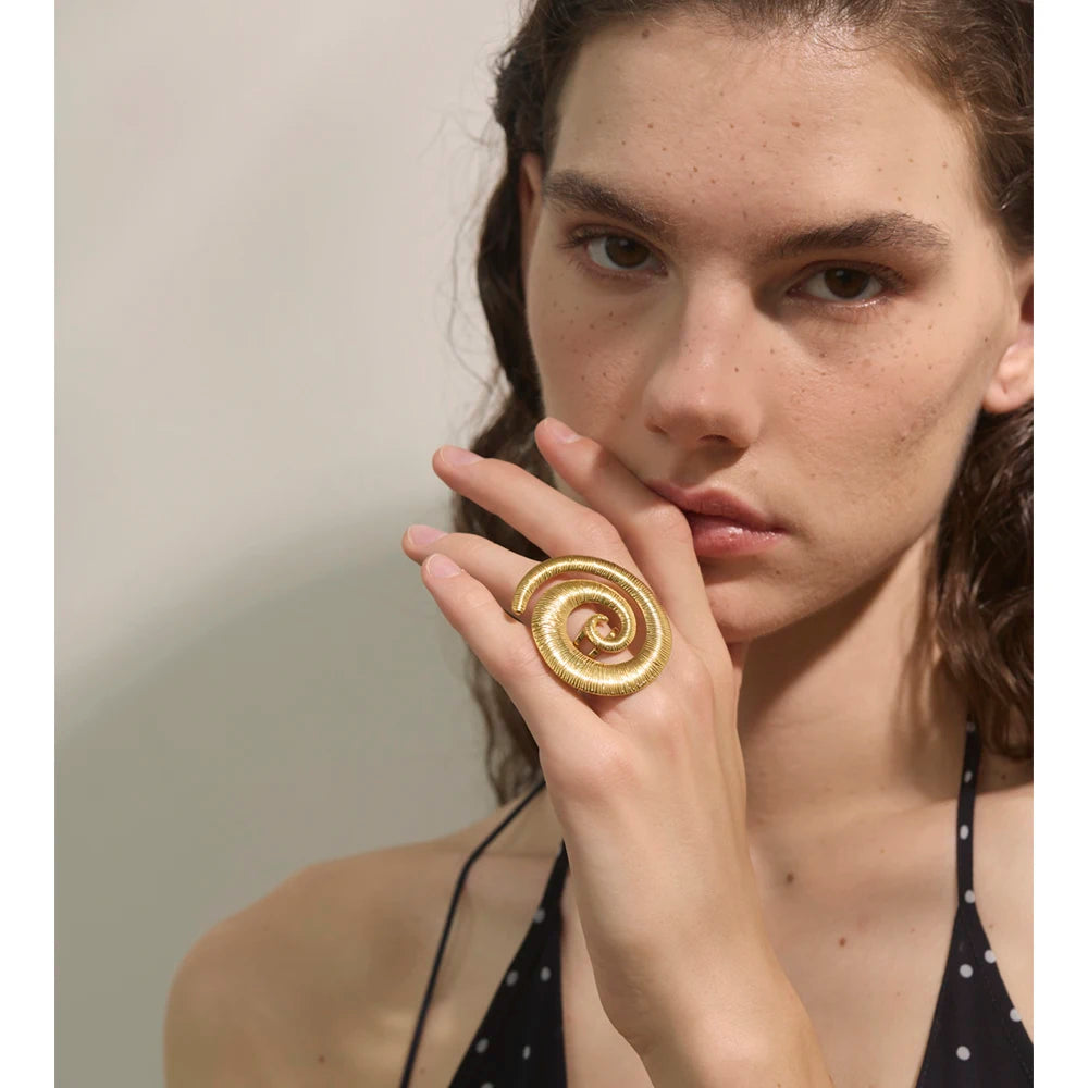 Stylised open ring with gold plated finish for modern golden jewelry looks