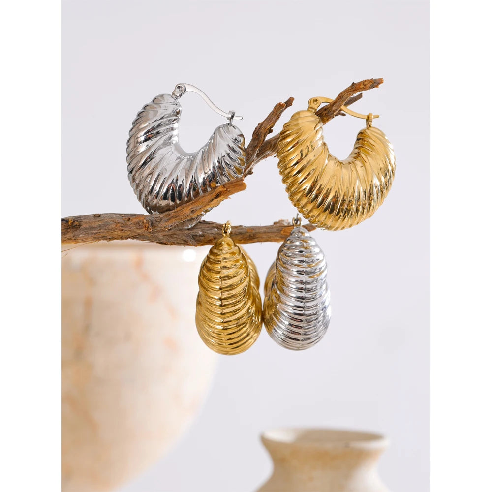 Classic gold hoop silhouette crafted as stainless steel jewelry