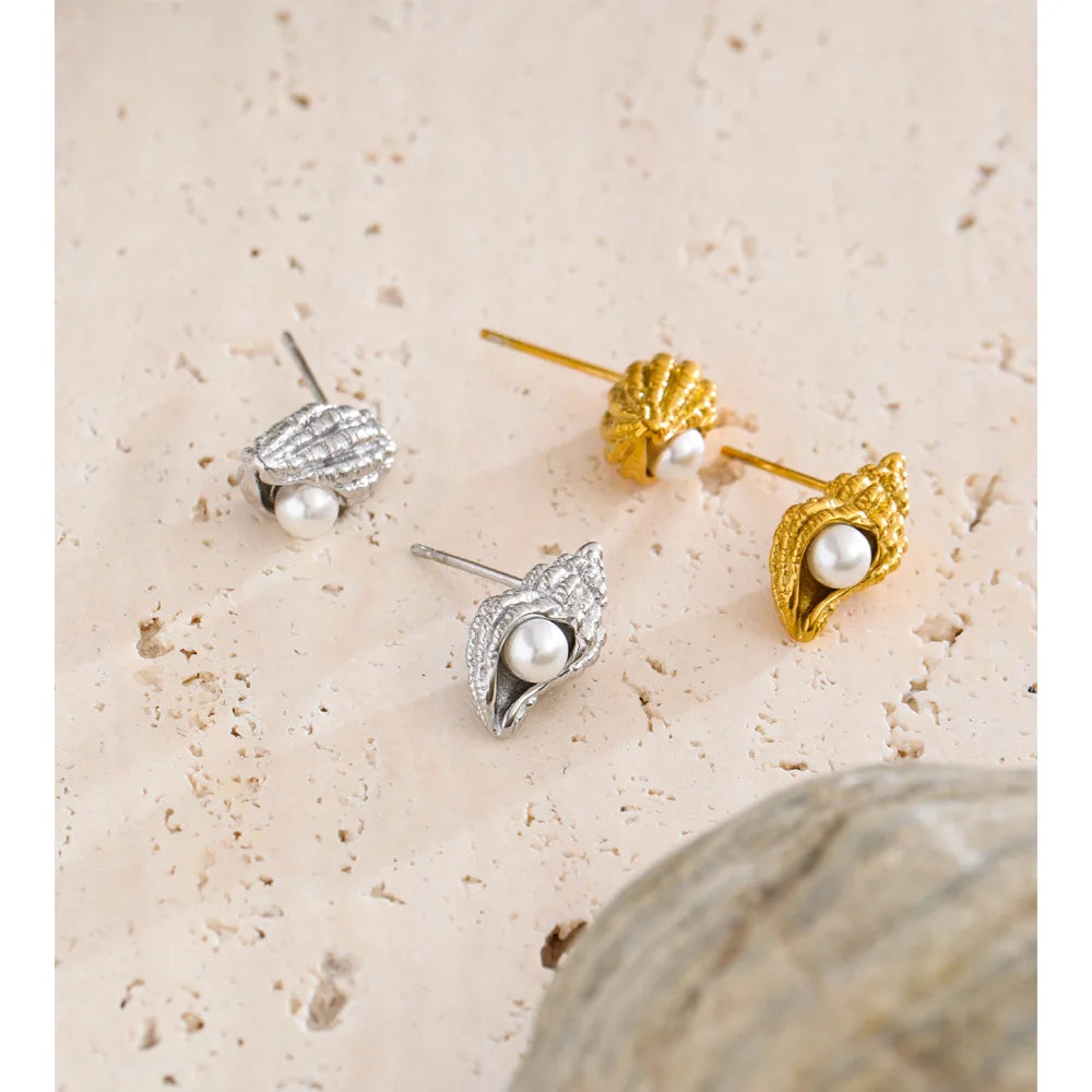 Elegant stud earrings featuring delicate pearl earrings glow