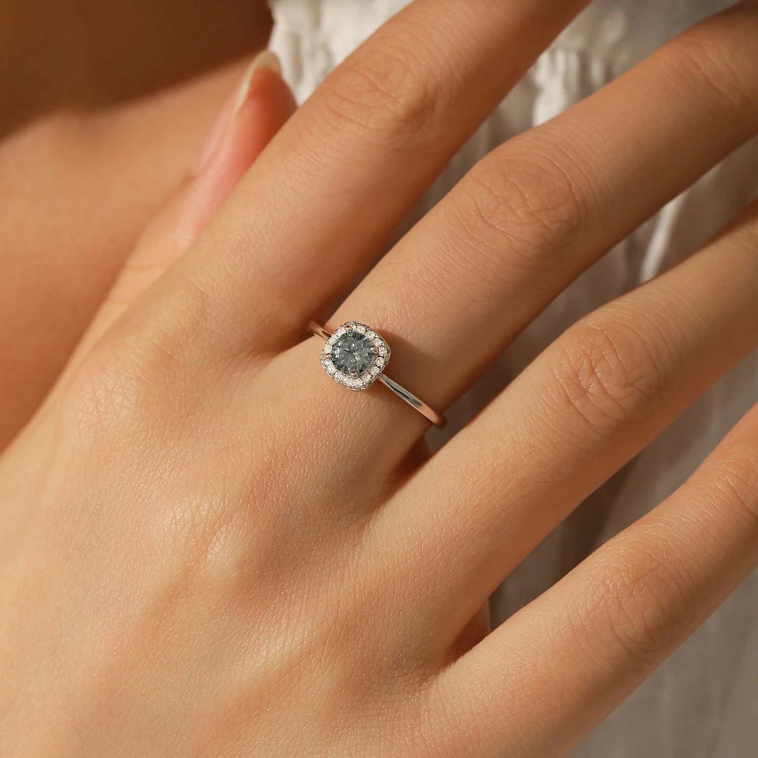 Sterling silver rings style featuring a gray moissanite halo ring