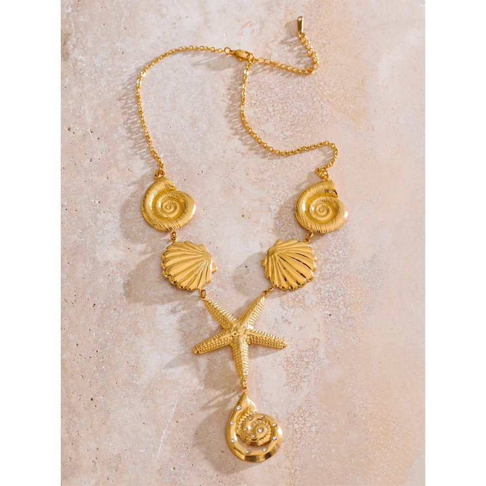 Charm necklace styled as necklace and pendant with soft gold plated finish