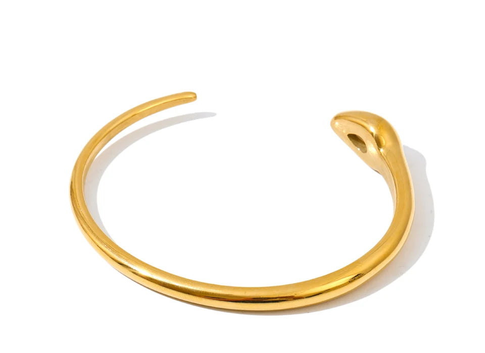 Gold bracelet bangle with shimmering zirconia detail