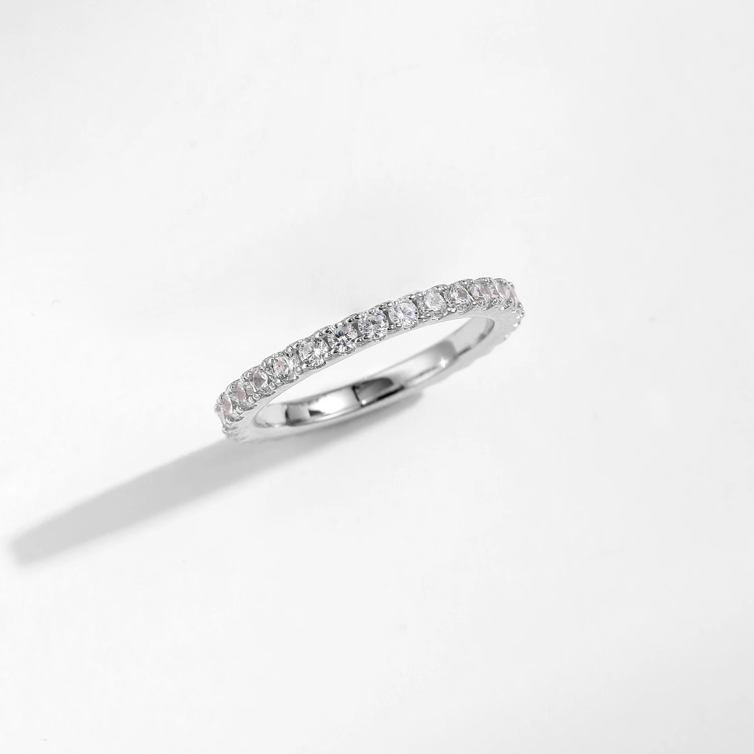 Elegant wedding band ring with smooth edges and reflective finish