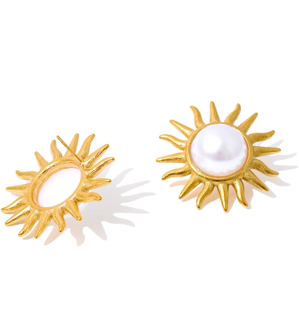 Jewelry on women wearing sun-inspired pearl gold studs