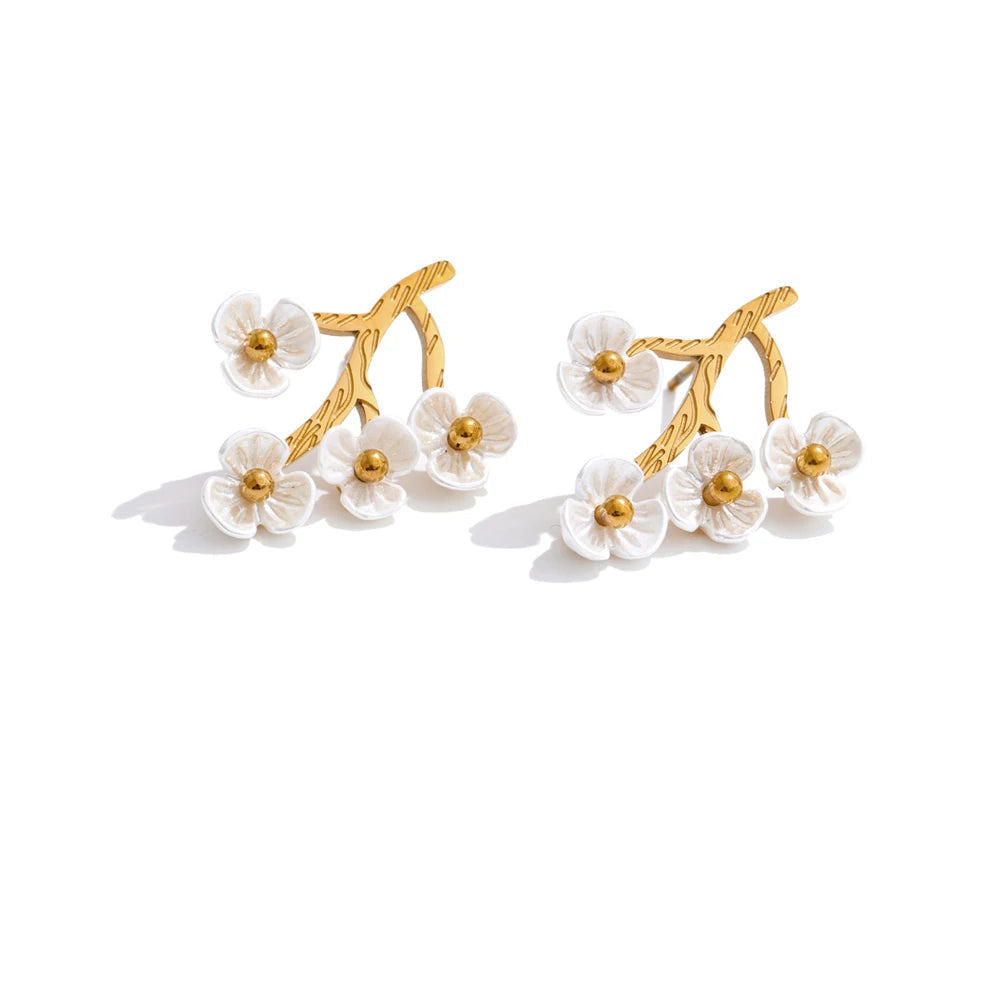 Gold plated flower in gold stud earrings shown as earrings and gold for a soft glow