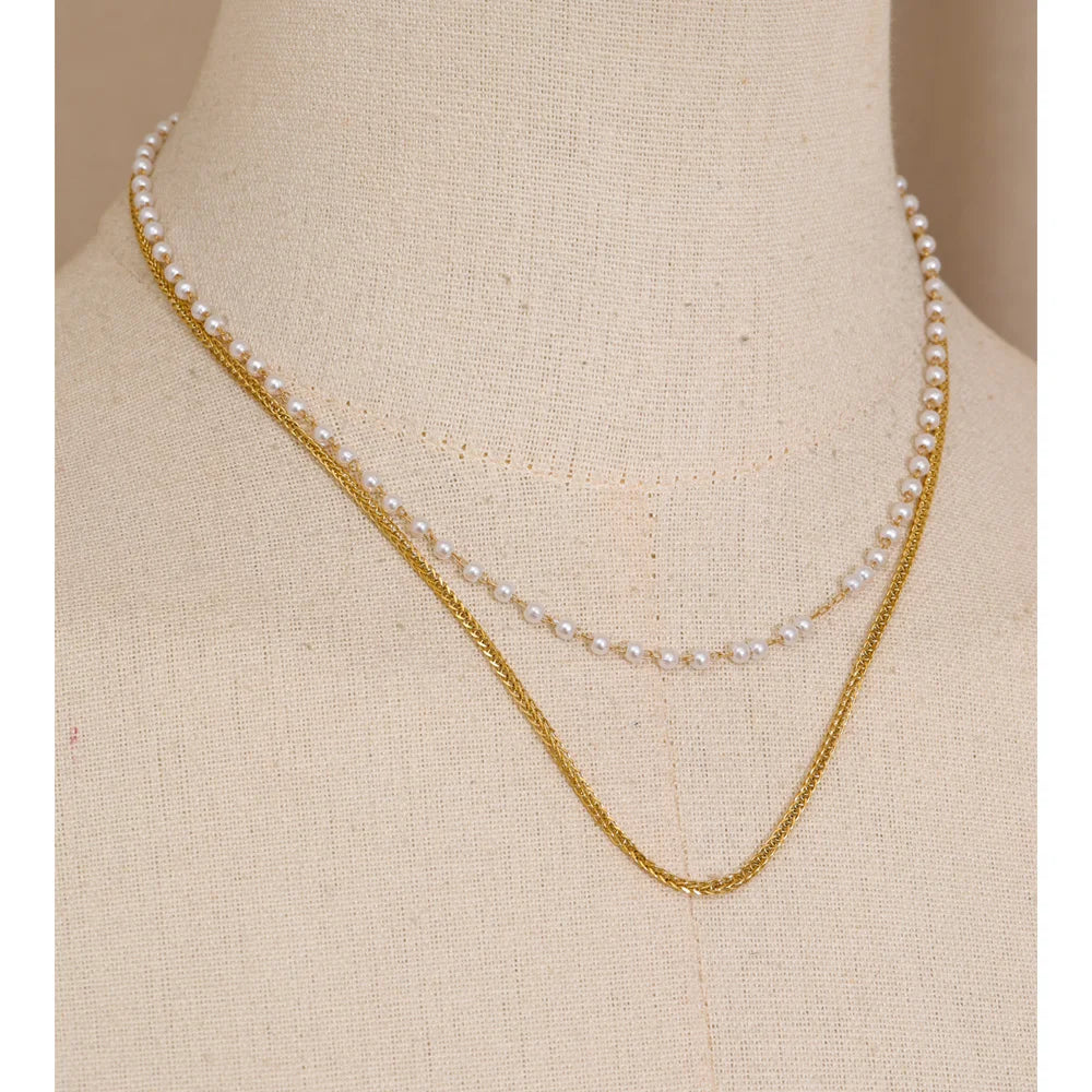 Stainless steel jewelry necklace with simulated pearls
