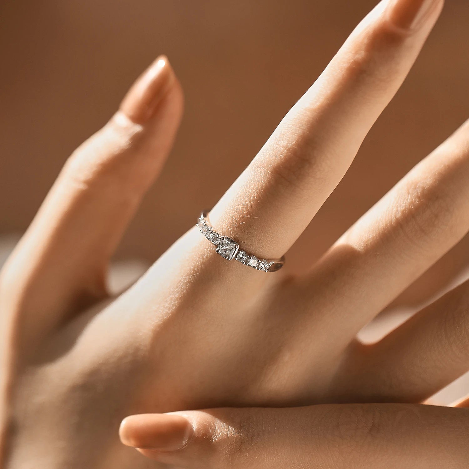 CZ rings detail on a polished band paired with jewelry sets