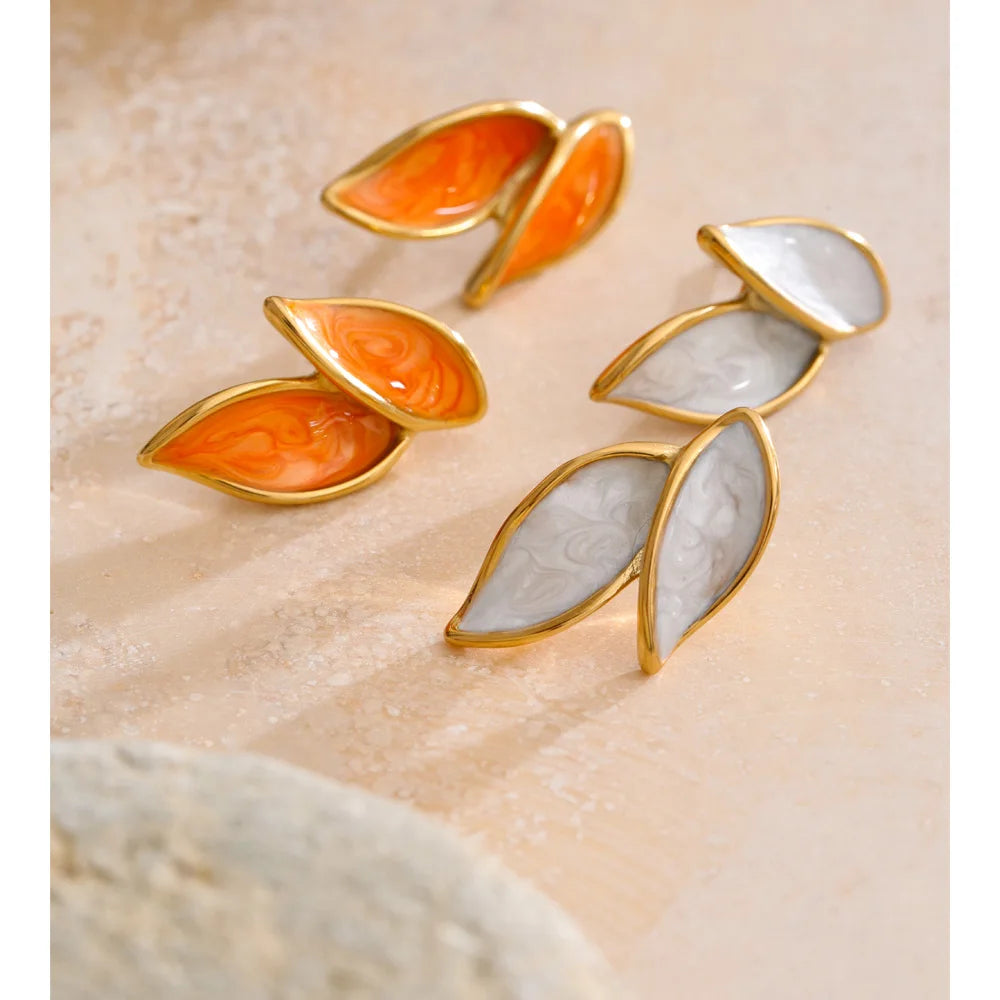 Elegant gold earrings with colorful enamel leaf design