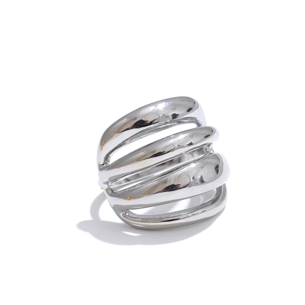 Flat lay of adjustable finger ring showing balanced ring size from ring