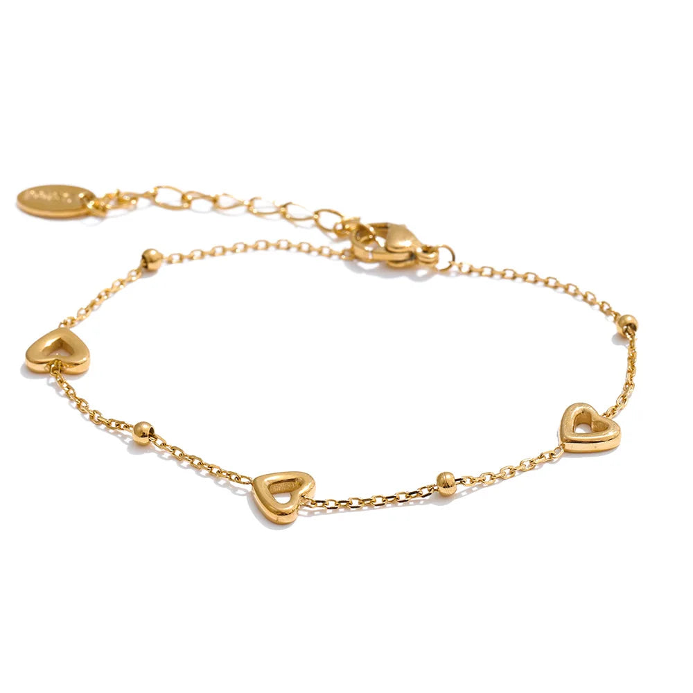 Charm for a bracelet shown with golden jewelry finish