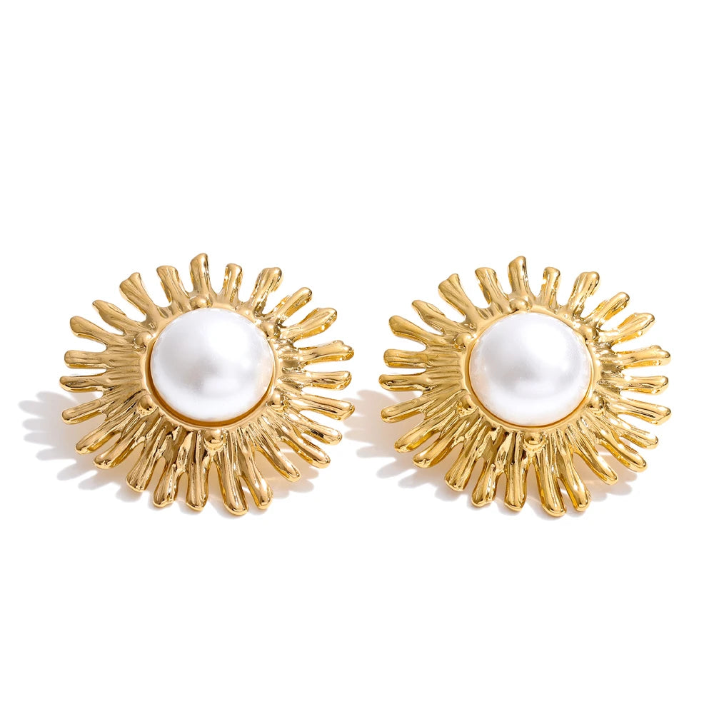 Front view of gold plated pearl flower stud earrings