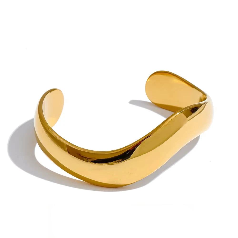 Smooth gold cuff bracelet with polished minimalist design