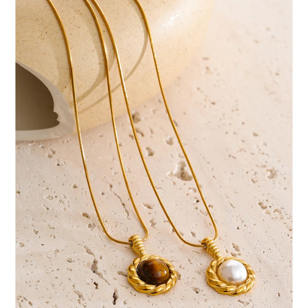 Natural tiger eye stone pendant paired with pearl on a necklace