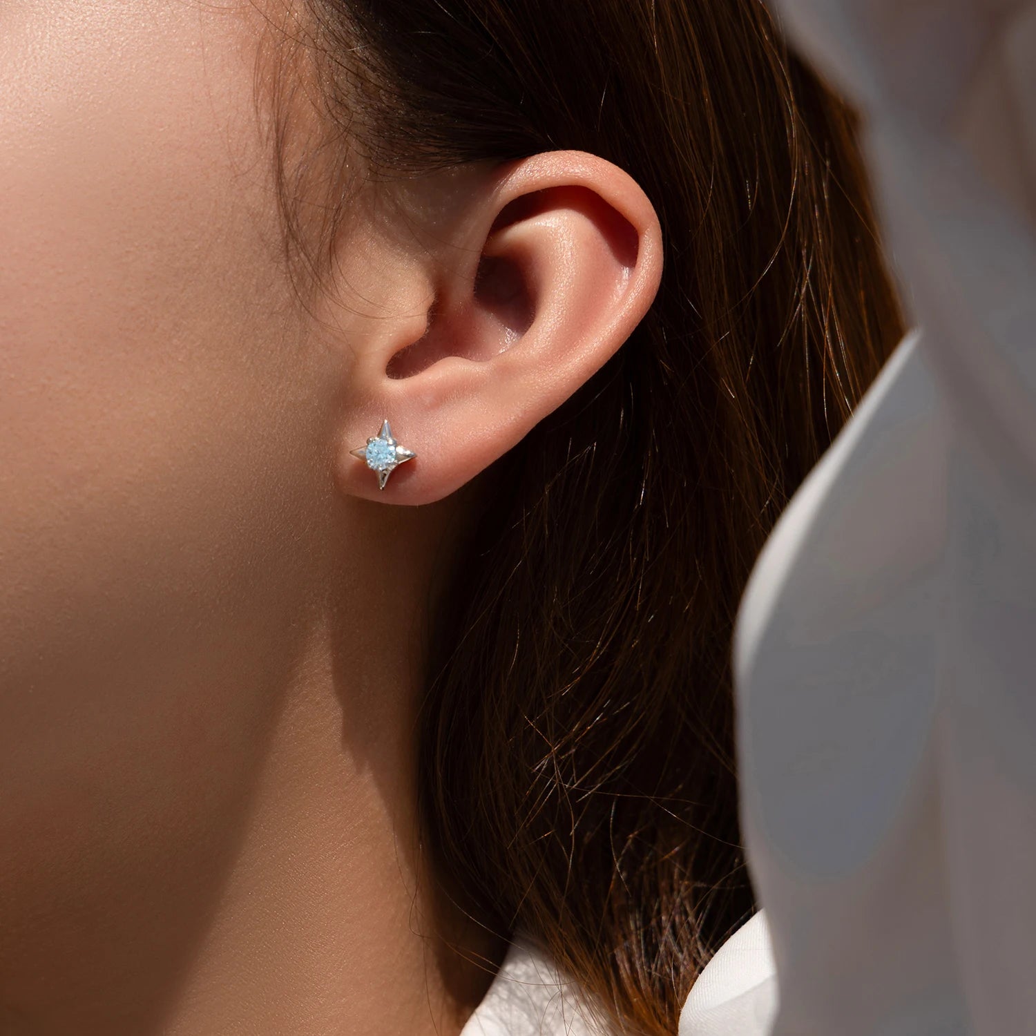 Earrings set of stud earrings displayed with a jewelry box