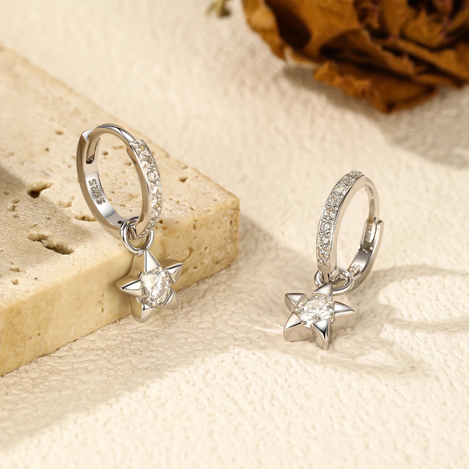 Side angle of hoop earrings featuring moissanite diamond brilliance