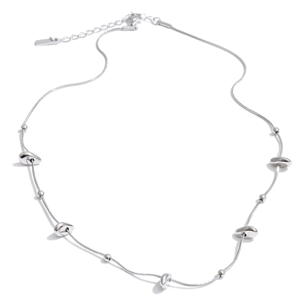 Bracelet with gold plated link design enhancing ensemble