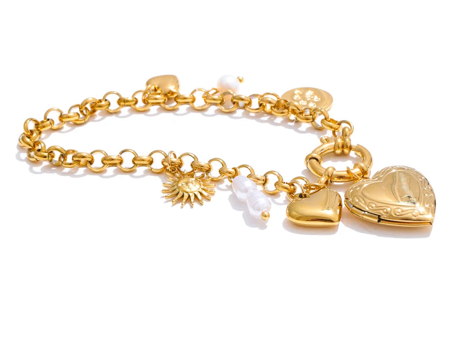 Soft light image of a chain bracelet with bracelet charms and bracelet pearl highlight