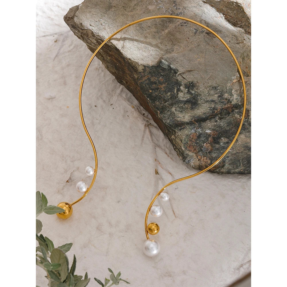 Imitation pearl necklace with gold plated torque choker design