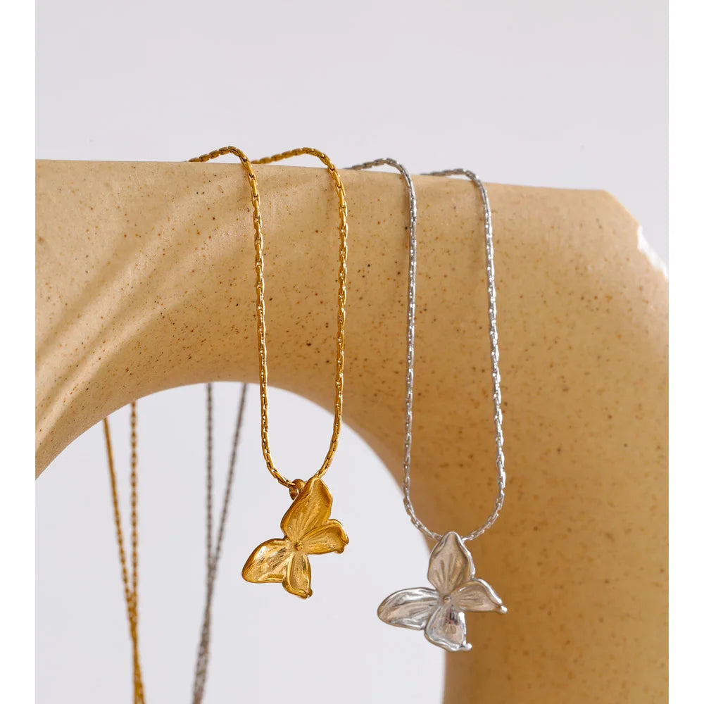 Women wearing gold necklace necklace gold butterfly charm