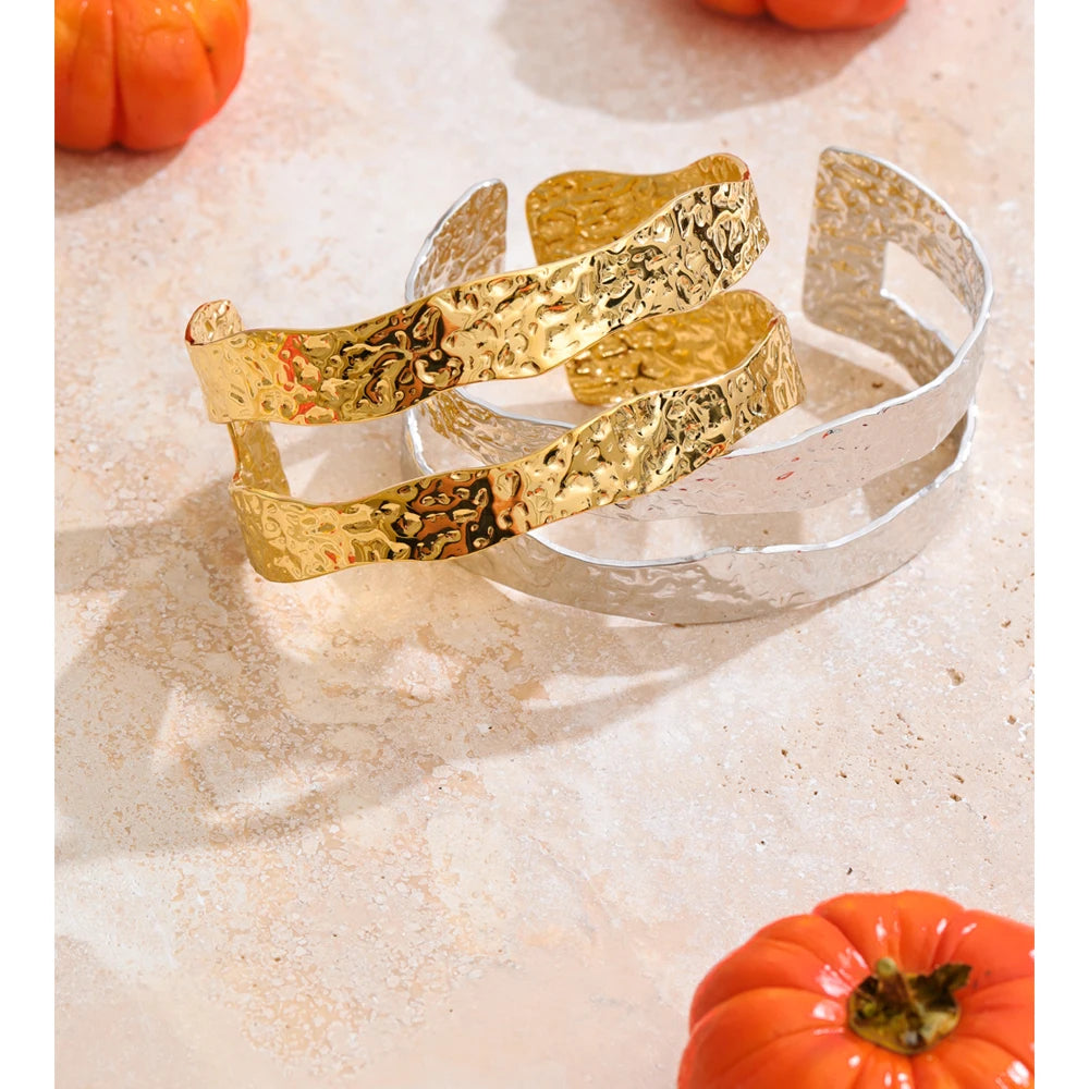 textured gold bangle bracelet with hammered finish and double cuff design