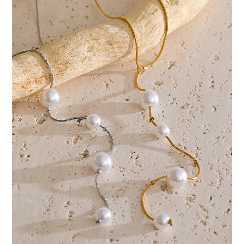 Pearl for necklace detailing on gold plated chain